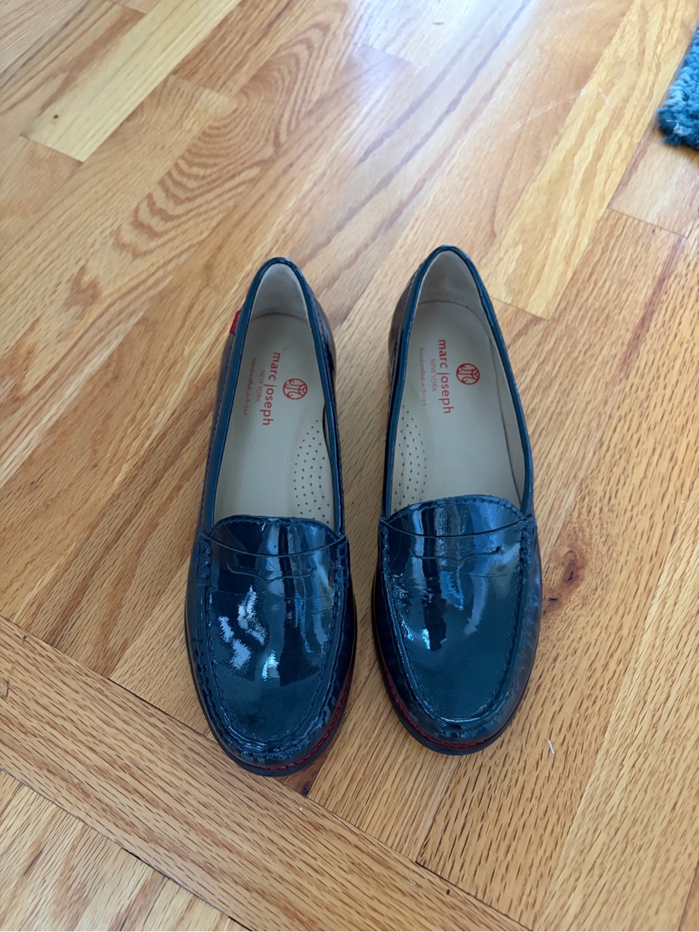 Marc Joseph Navy Patent Leather Penny Loafers with Red Accent